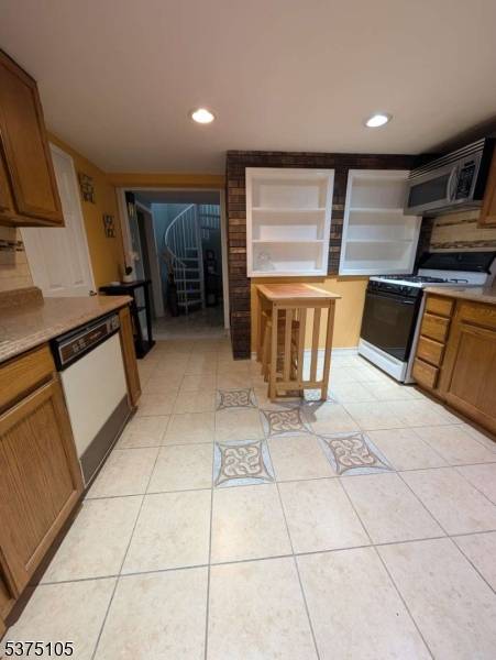 2 Family GEM with Income Potential Luxe Upgrades in Woodland Park !