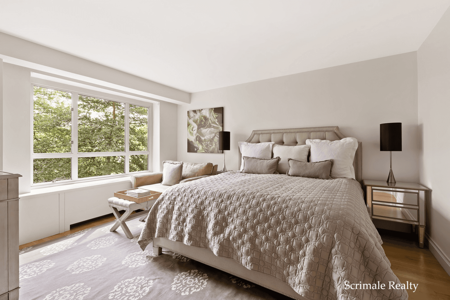 This split two bed two bath residence features bright northern and eastern exposure and beautiful tree views.