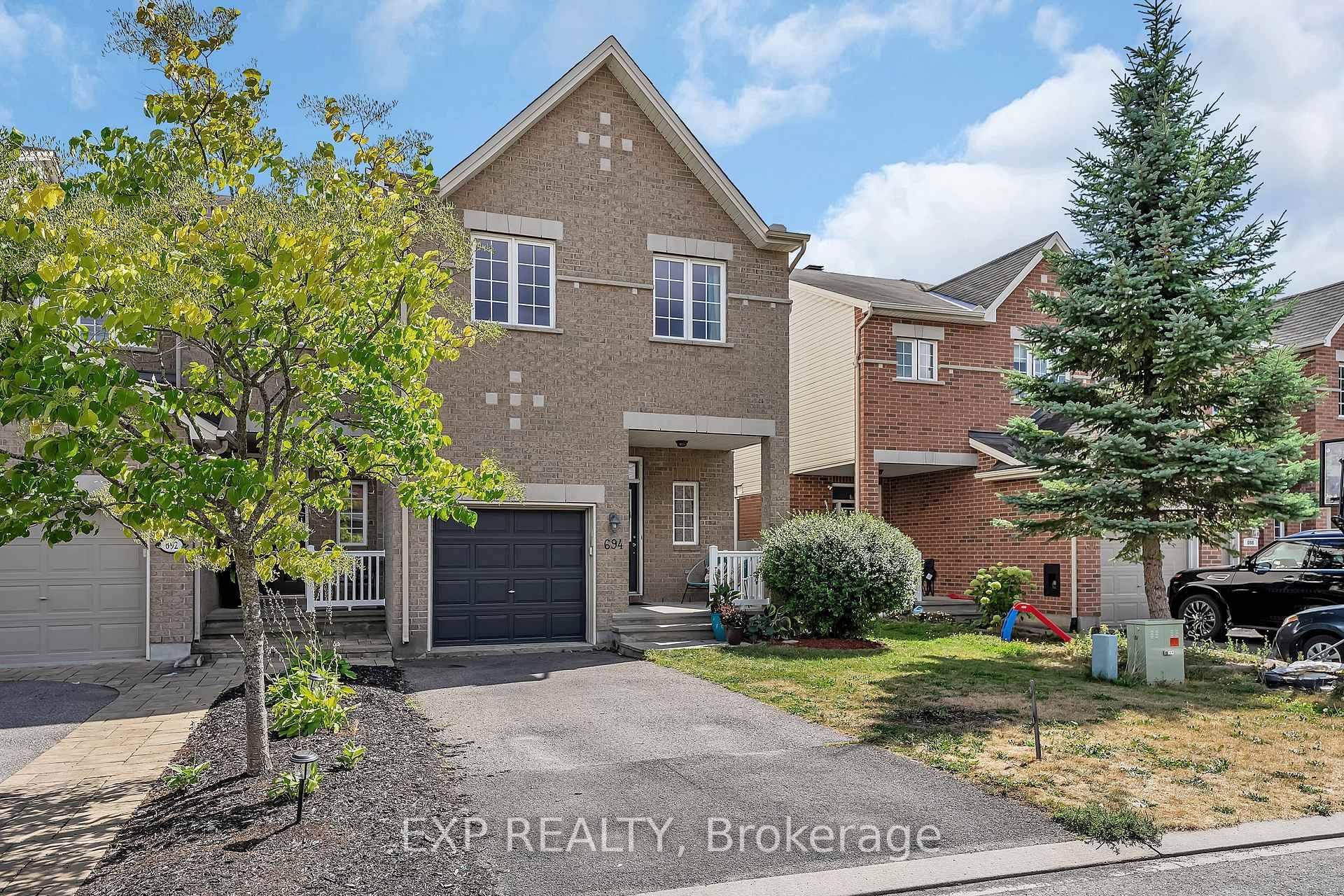 Beautiful and spacious end unit townhome in the heart of desirable Riverside South, just steps to the new shopping plaza and future LRT station.