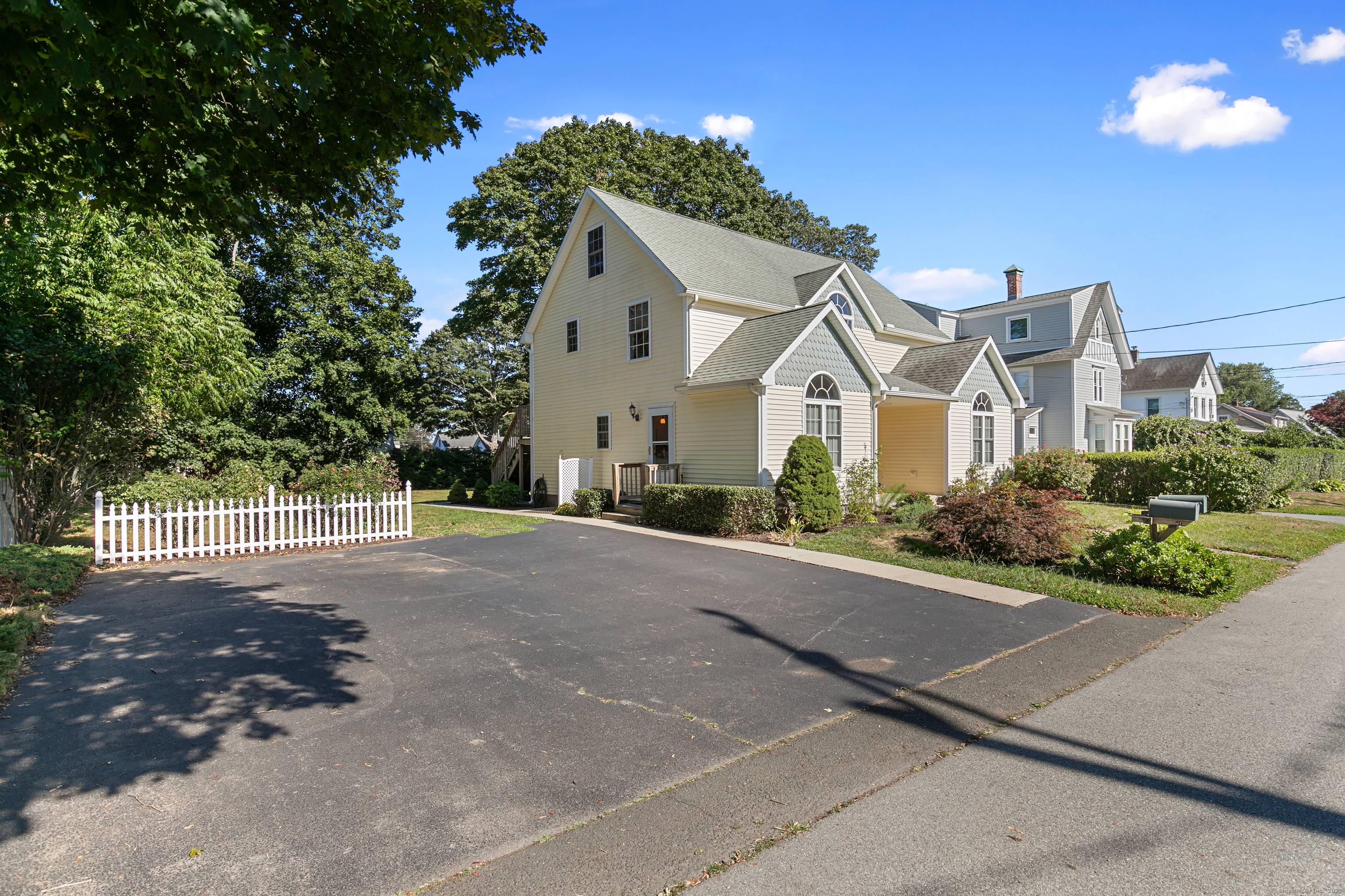 Embrace the ultimate shoreline lifestyle with this stunning two family home perfectly positioned in the heart of coveted Niantic Village.
