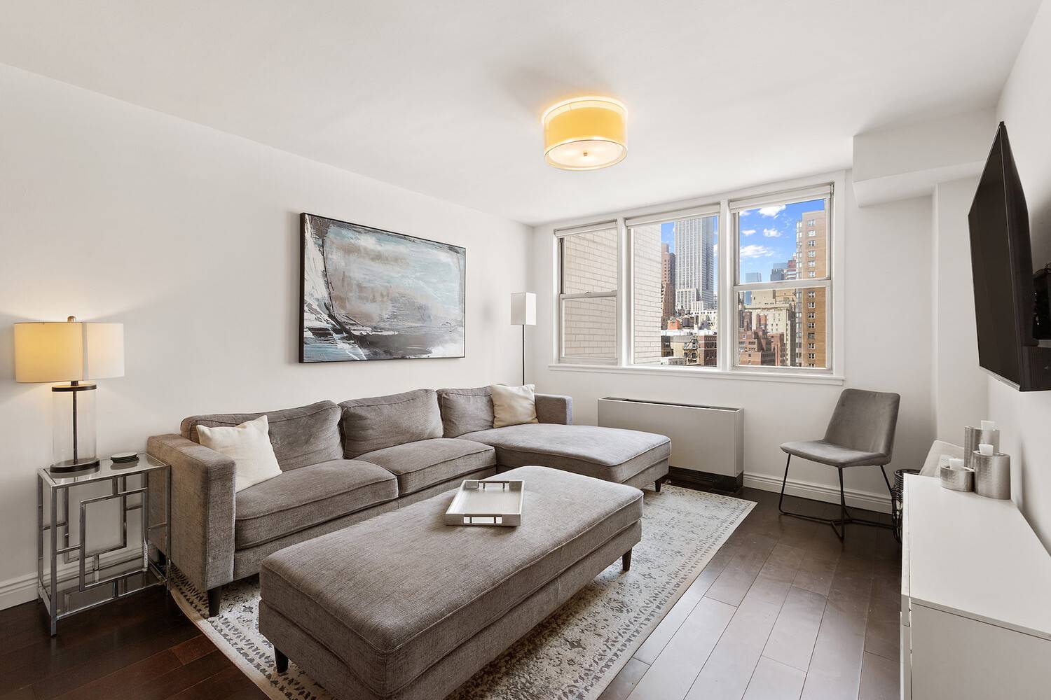 Stunning and beautifully renovated 2br 1bth with gorgeous open city views of the Empire State Building, and peak of the river.