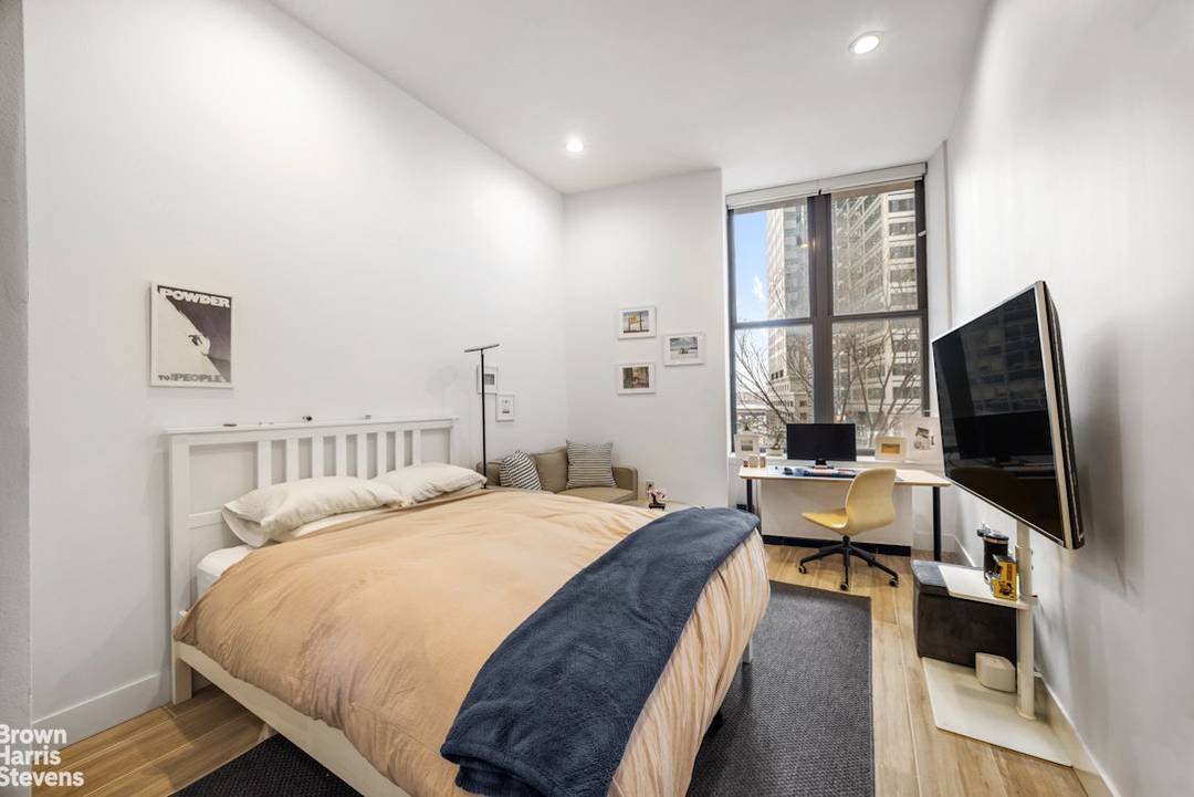 The open layout is complemented by an east facing exposure with corridor views to the water, bringing in natural light and a sense of openness.