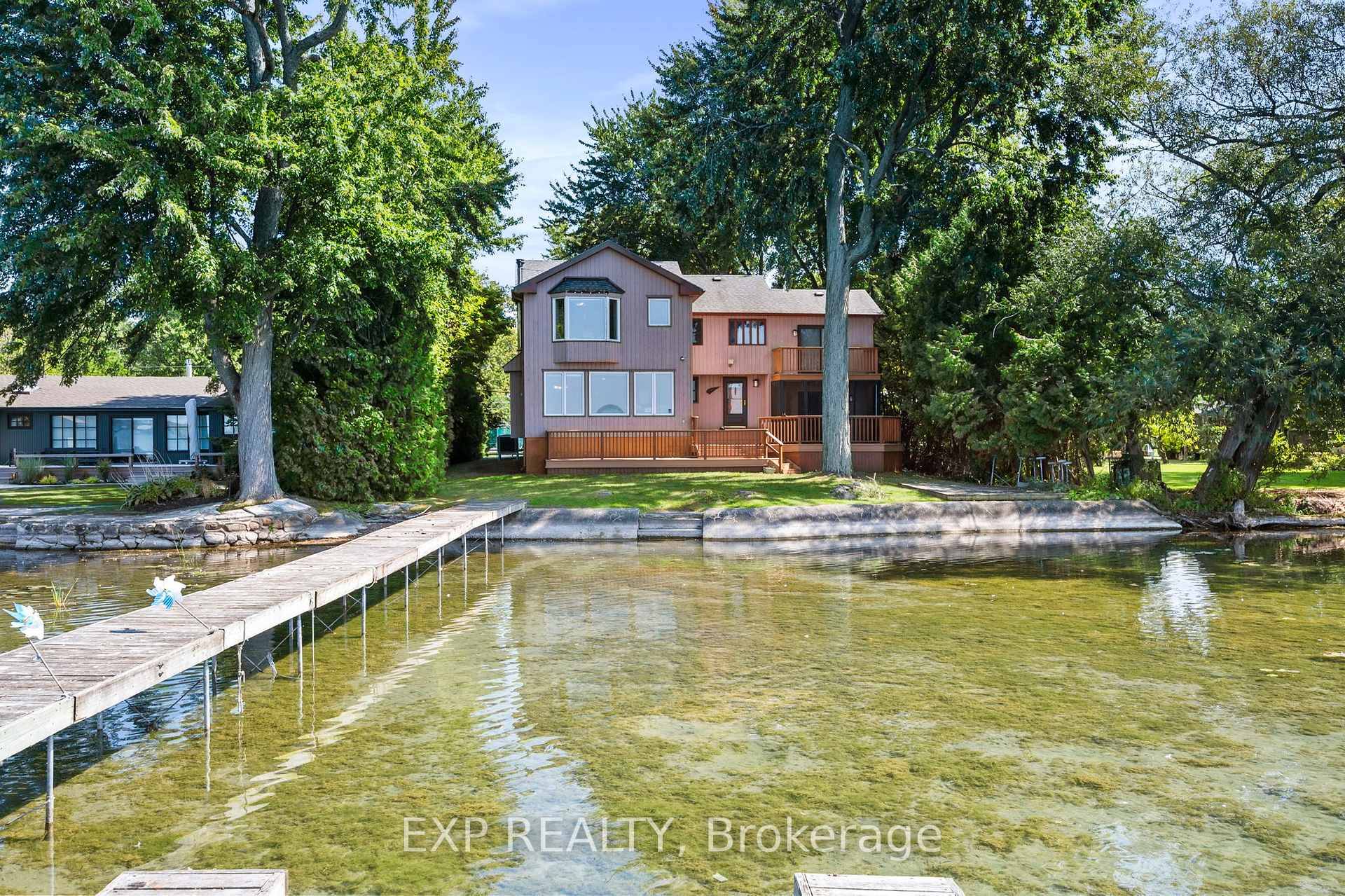 Location ! Direct Waterfront In A Luxury Area Of Duclos Point Peninsula With Breathtaking Sunsets View And Retaining Wall At The Beach.