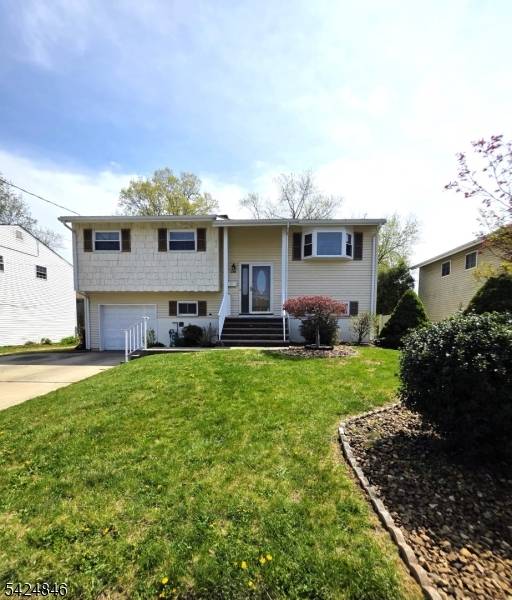 This fabulous home offers 4 bounteous bedrooms plus an incredible sunroom addition.