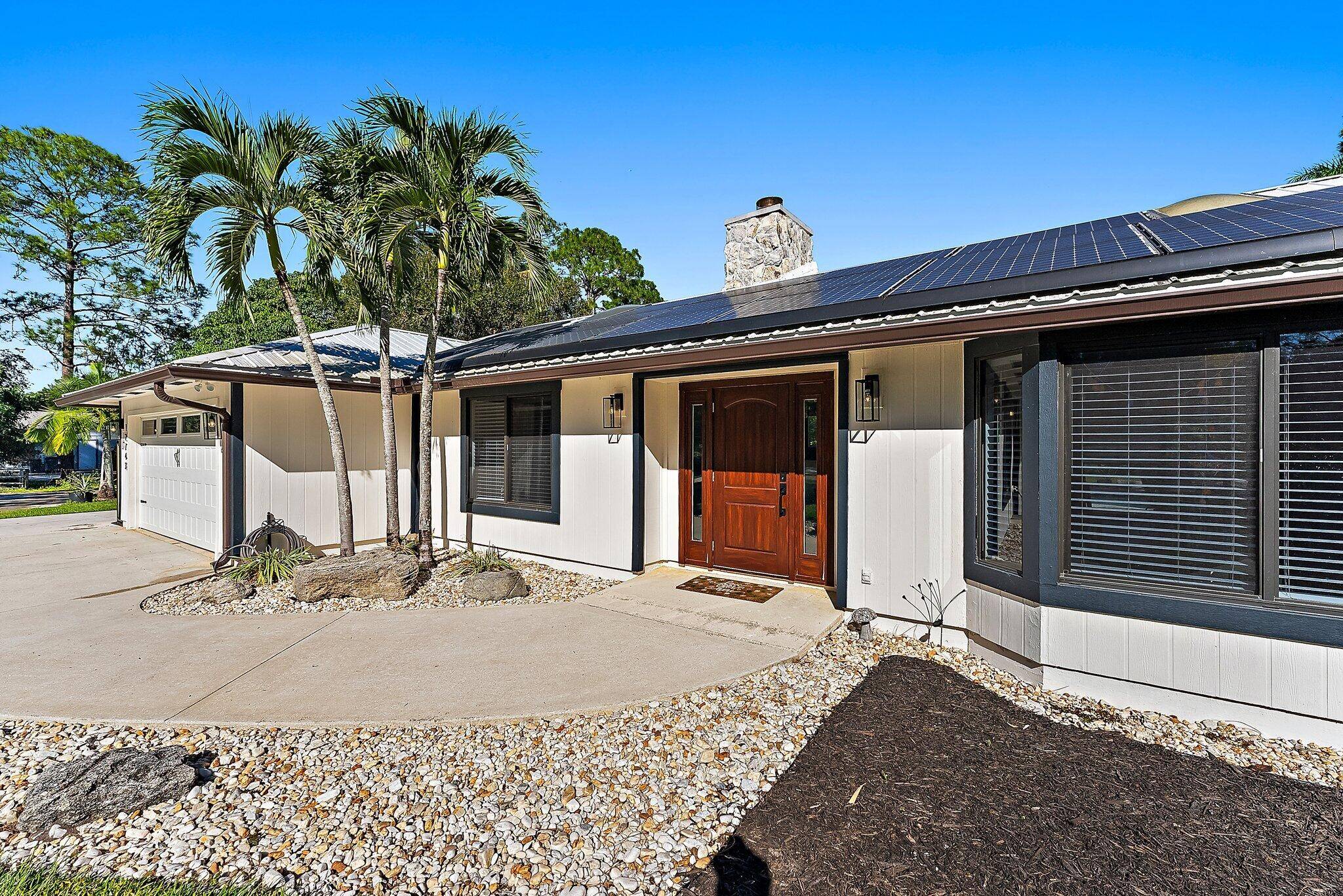 Private 1. 55 Acre Retreat with Multigenerational Guest House, Pool, and Detached WorkshopThis recently renovated, move in ready home offers an array of desirable features a main house, a multigenerational ...