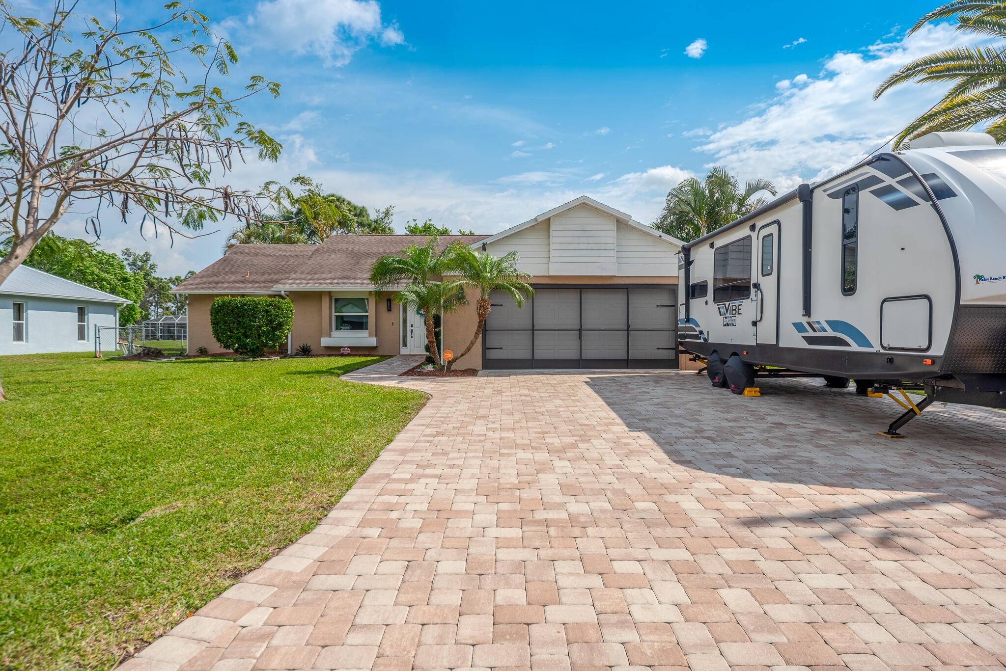 This 3 bedroom, 2 bathroom home with a 2 car garage offers stunning lake views and a prime location near top schools and beaches.