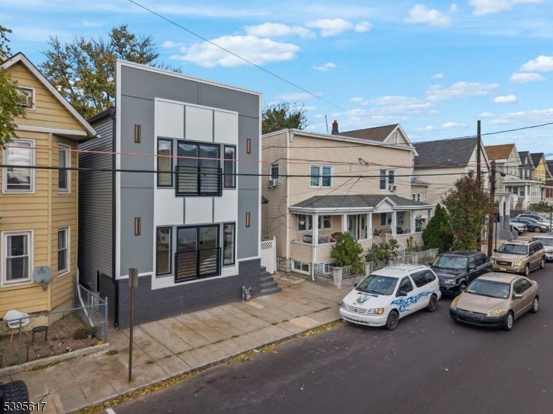Welcome to this stunning, fully rebuilt home in the heart of Perth Amboy.