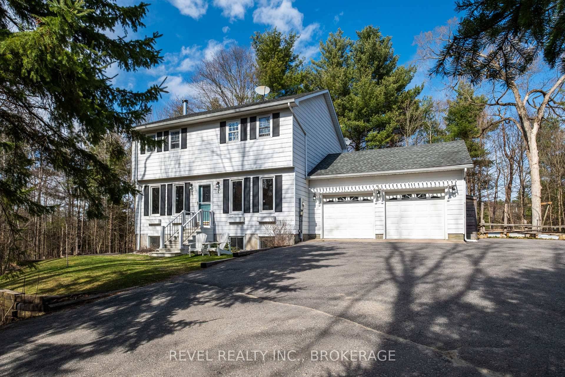 Welcome to 7772 Highway 38 where modern living meets country serenity.