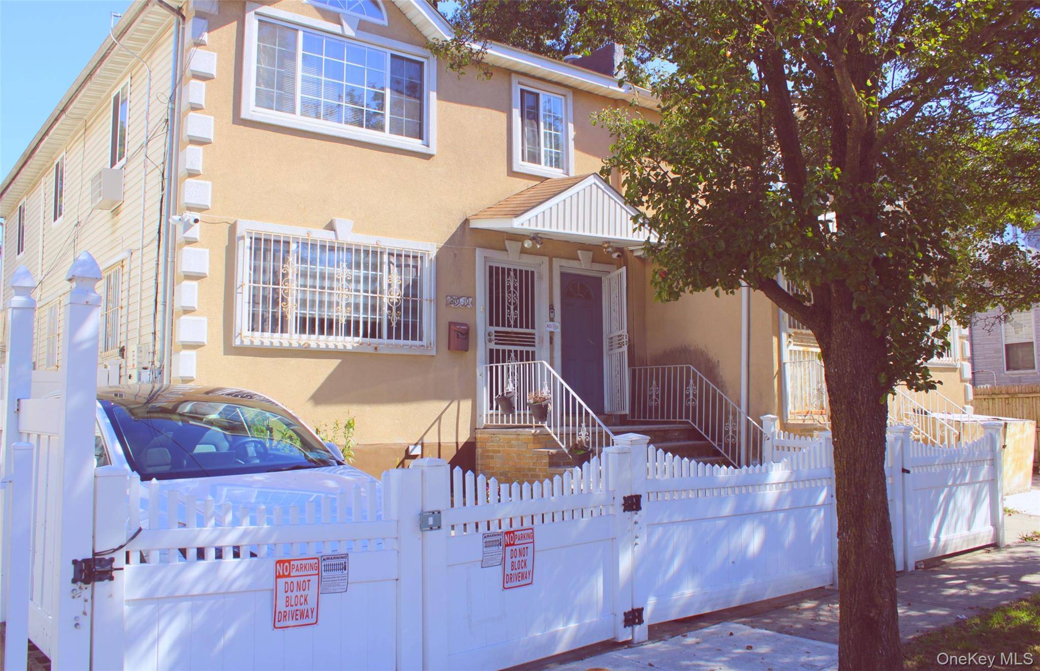 Welcome to 219 19 143rd Road, a well kept two family home offering space, versatility, and exceptional outdoor living.