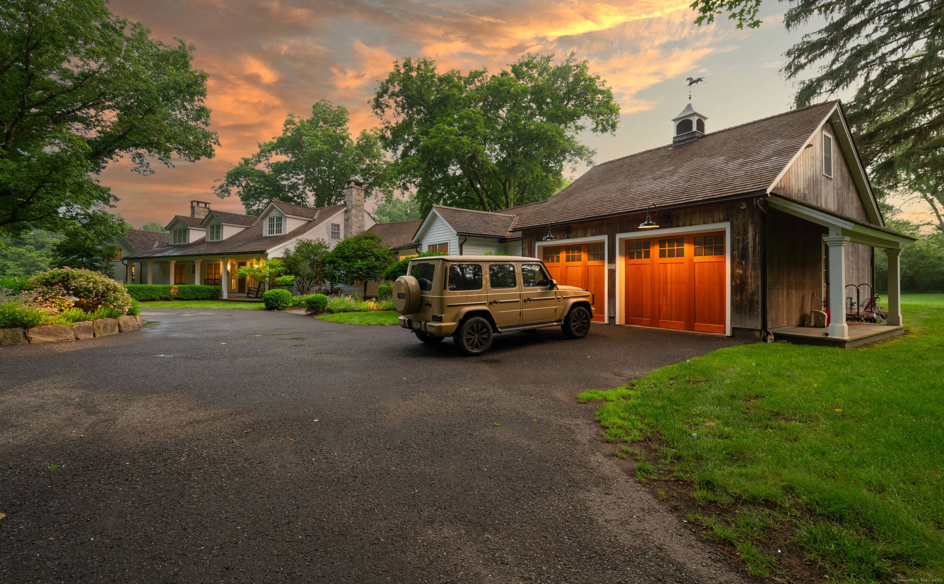 Tucked away in absolute privacy, yet centrally located, this exceptional estate offers 6, 300 square feet of refined living space that seamlessly blends country sophistication modern luxuries.