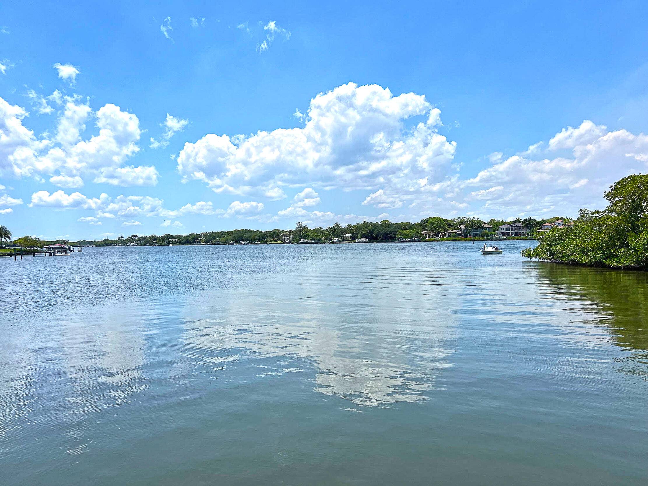 One of the few remaining wide river lots on the Loxahatchee River with lovely sunset views in a private cove.