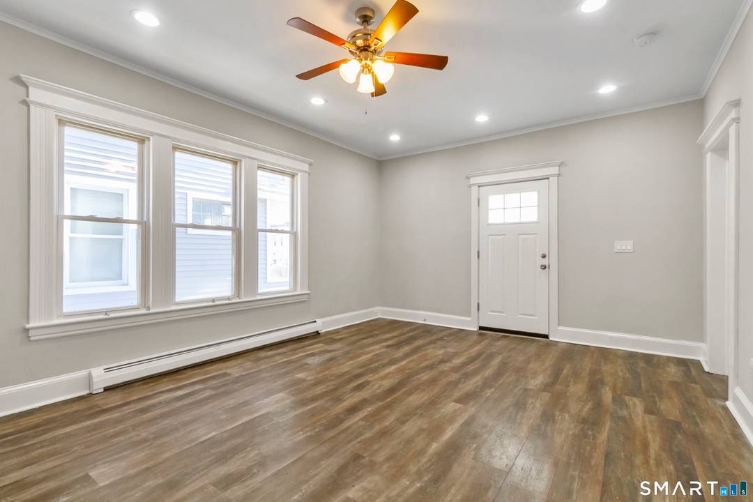 This well maintained Colonial home features traditional design elements and thoughtfully arranged living spaces.