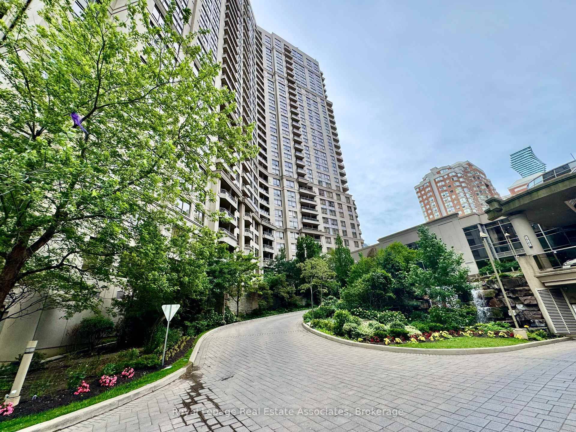 This stylish unit features light flooring throughout and a bright, open concept layout that seamlessly combines the kitchen, living, and dining areas perfect for modern living and entertaining.