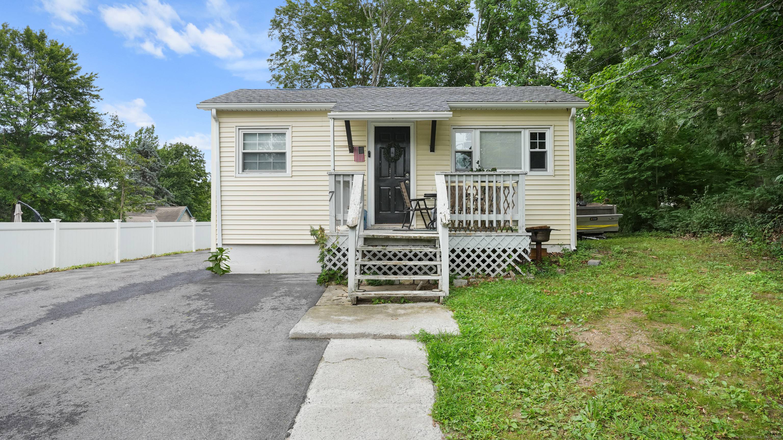 Welcome to 7 Candle Hill Road, a beautifully updated ranch style home nestled in the heart of New Fairfield, Connecticut.
