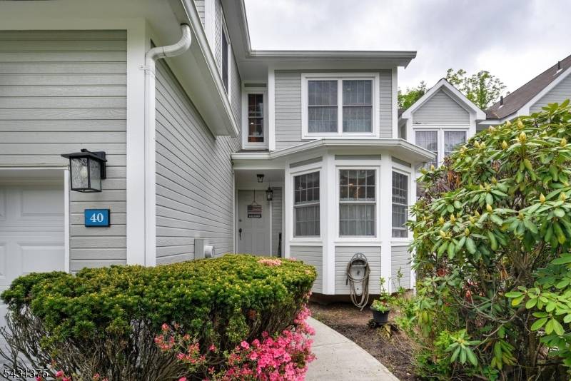 Discover the perfect blend of comfort, convenience, and low maintenance living in this beautifully maintained townhome featuring a sought after ground level primary bedroom suite, ideal for easy first floor ...
