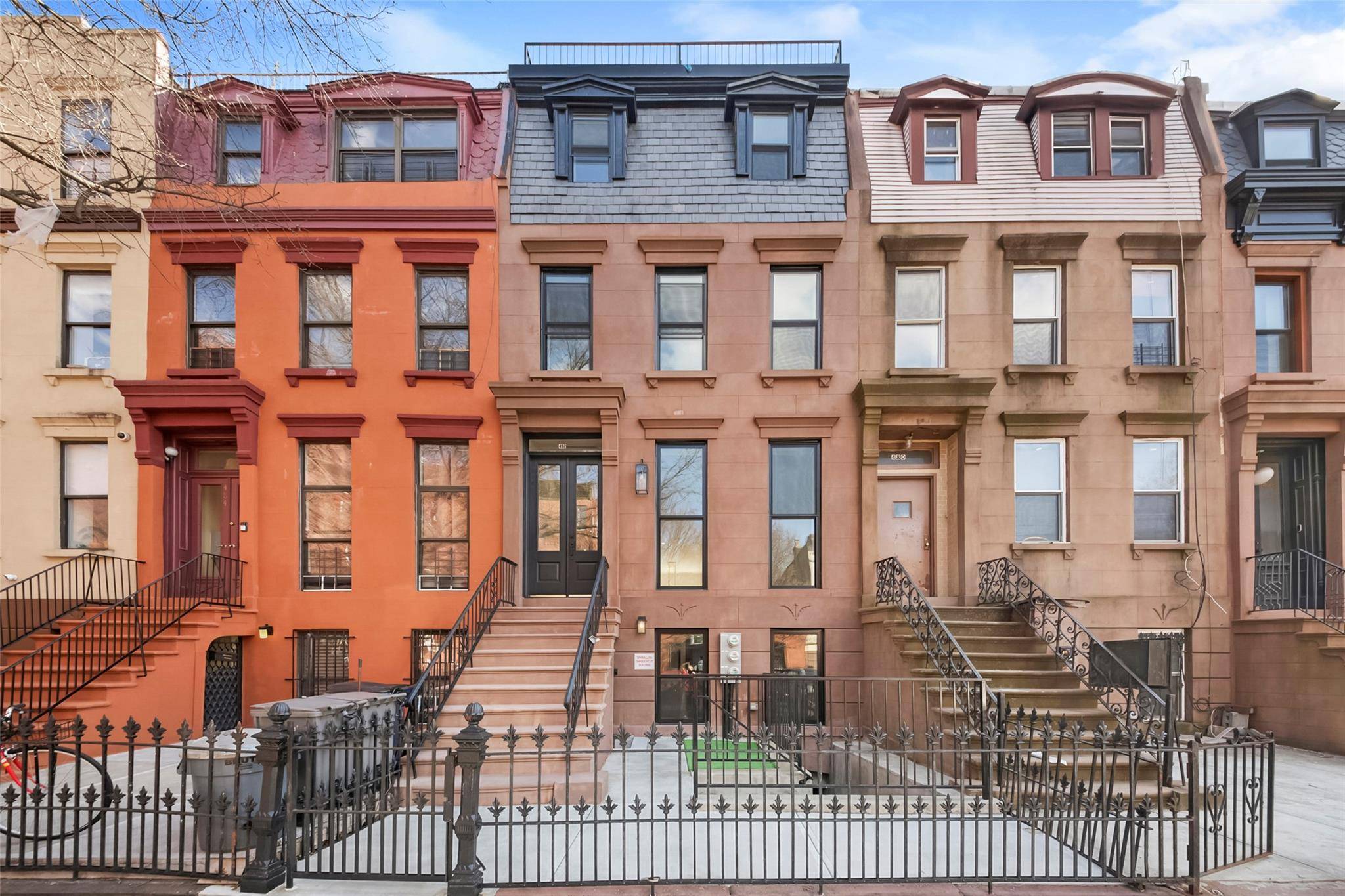 Step into timeless elegance and modern sophistication in this extraordinary tri plex over duplex brownstone, masterfully renovated from top to bottom.