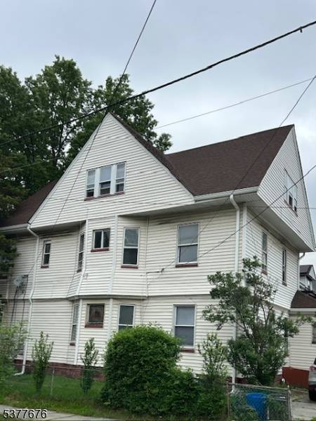A two family home with Finished basement with bathroom and Attic finished with bathroom.