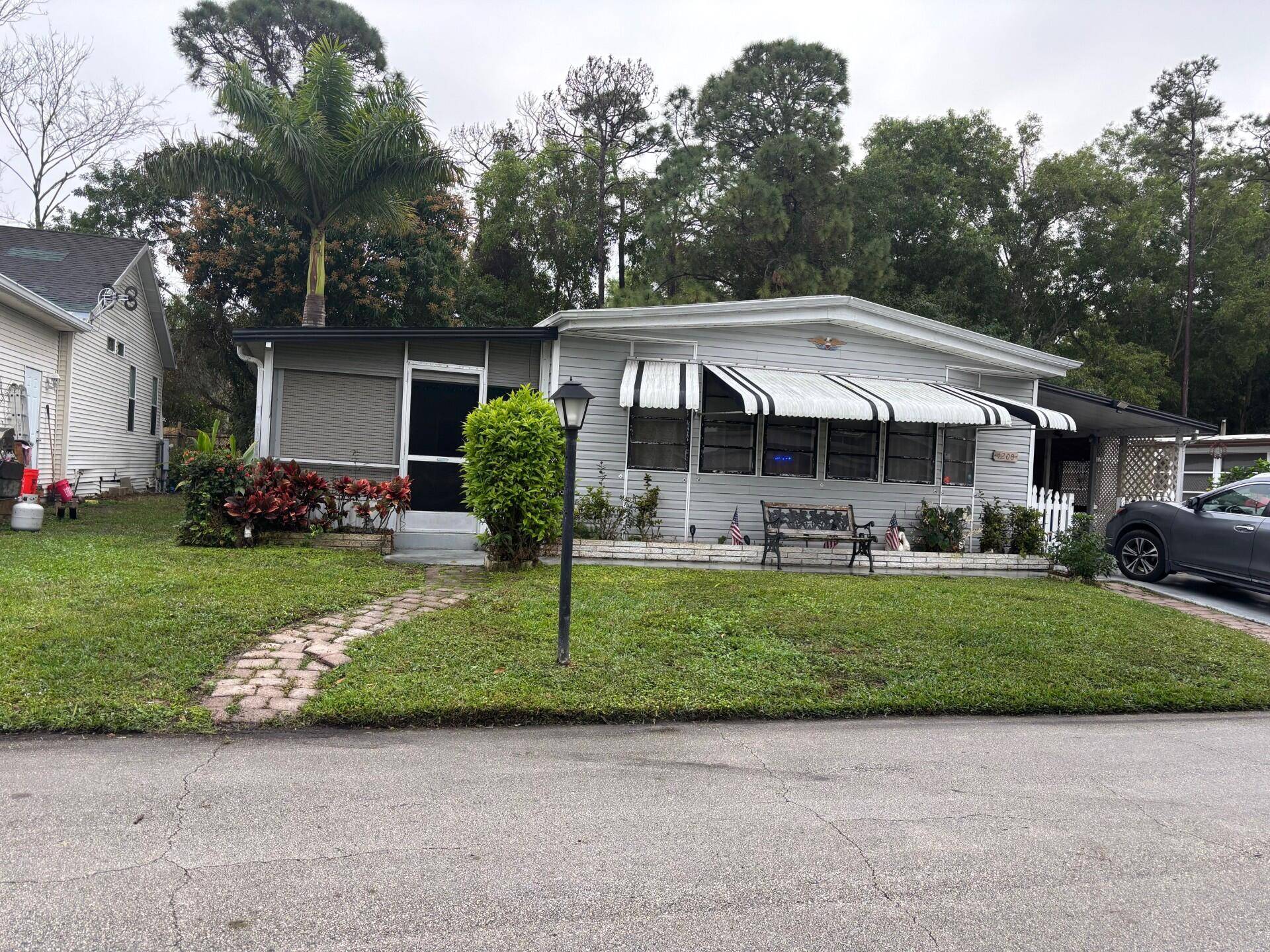 DON'T MISS THE OPPORTUNITY TO VIEW THIS SPACIOUS 3 BEDROOMS, 2 BATHS AND ENCLOSED FLORIDA ROOM WITH A SEPARATE ENTRANCE.