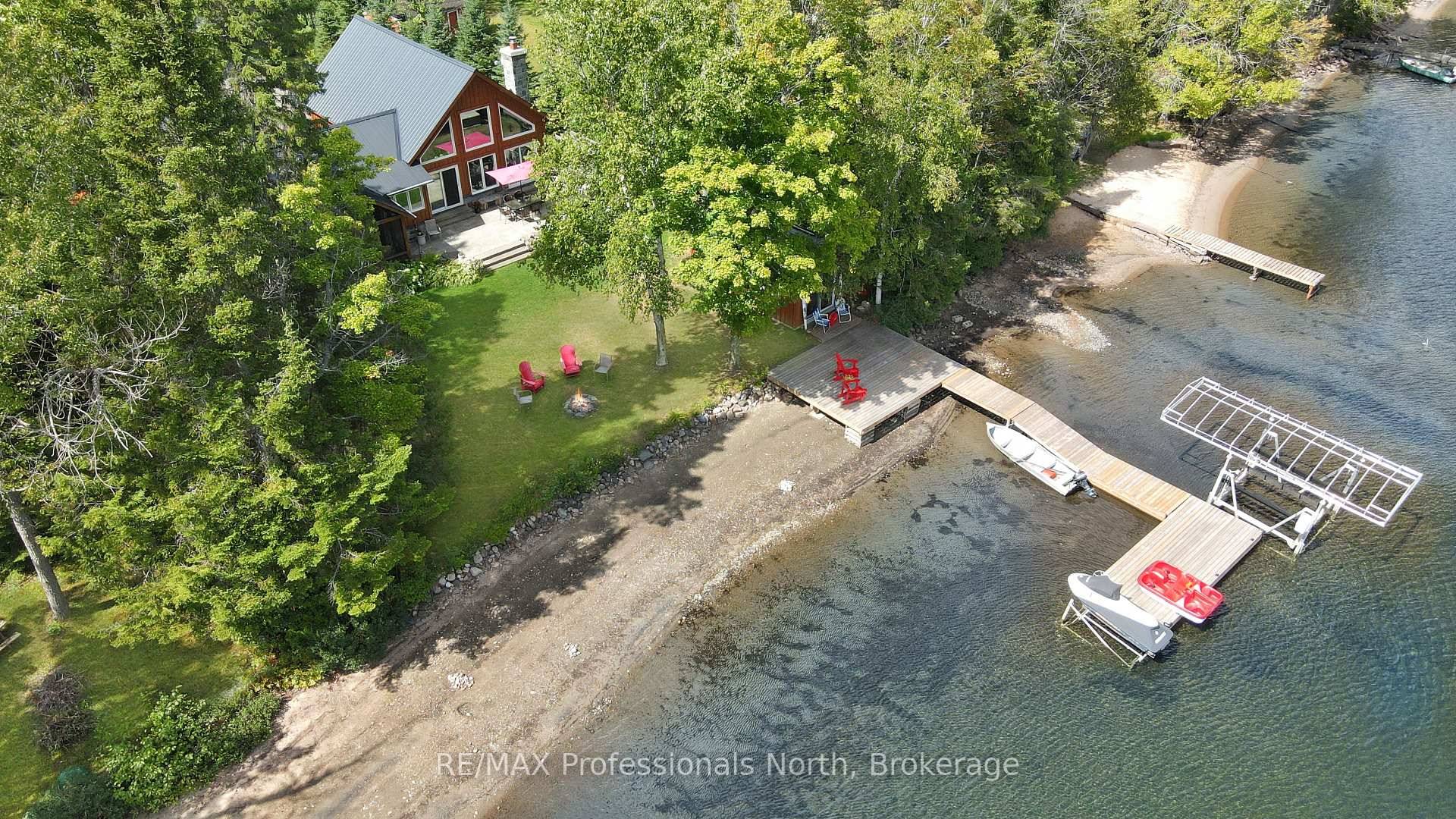 Discover your own slice of paradise at this exceptional lakefront property on Twelve Mile Lake part of a 3 lake chain offering miles of boating.