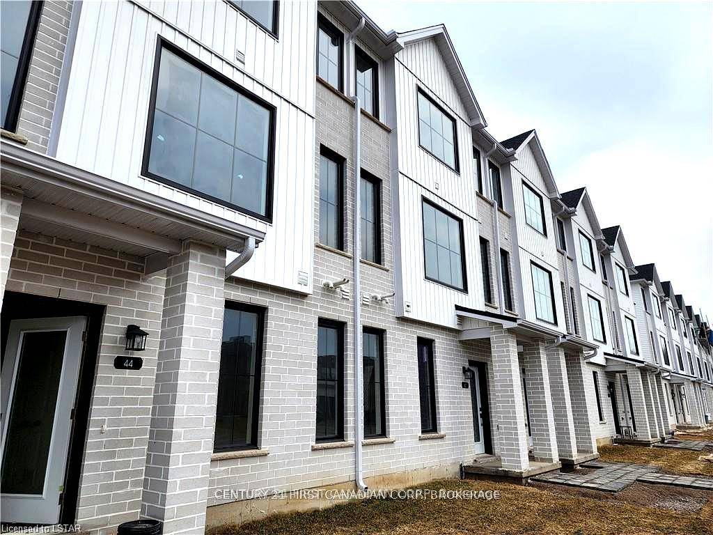 Located in the desirable Gates of Hyde Park community, this brand new 4 bedroom, 3.