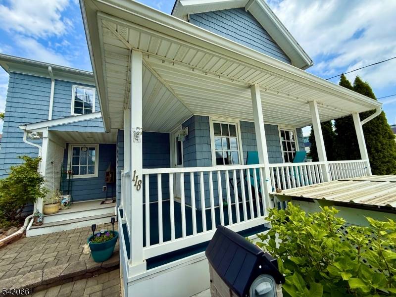 PREPARE TO BE DAZZLED BY THIS SPECTACULARLY RENOVATED VINTAGE COLONIAL WHERE TIMELESS COASTAL CHARACTER MEETS MODERN BEACH HOUSE GLAMOUR !