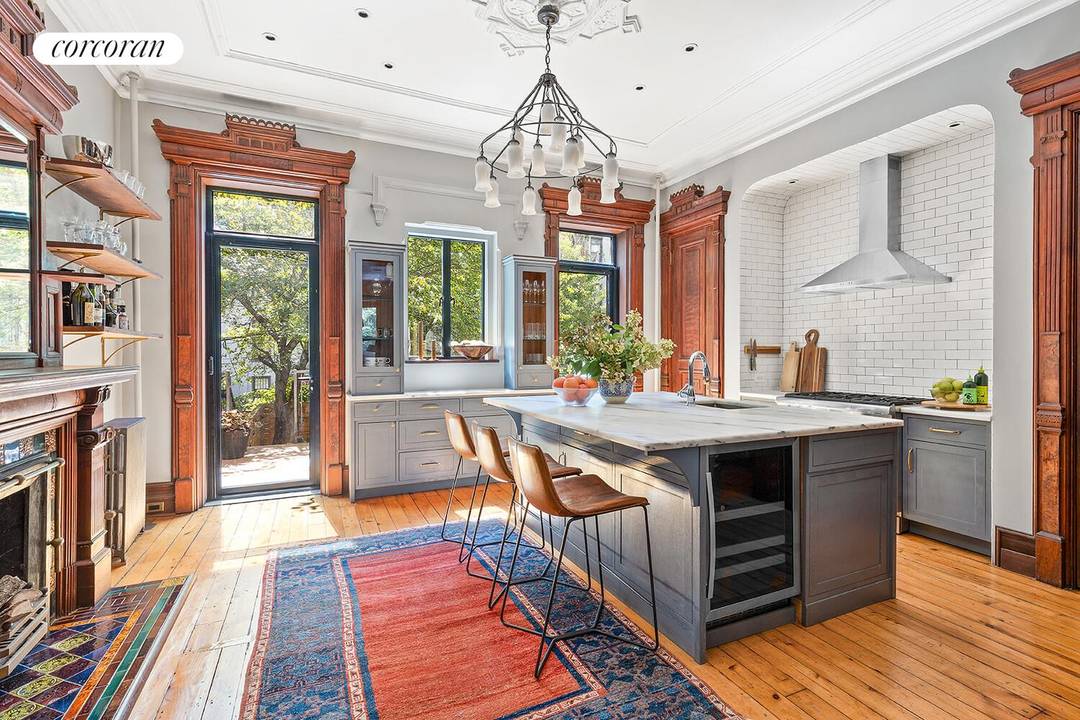 A rare blend of preserved prewar detail and thoughtful modern renovation, this 20' wide brownstone in prime historic Bed Stuy offers remarkable flexibility.