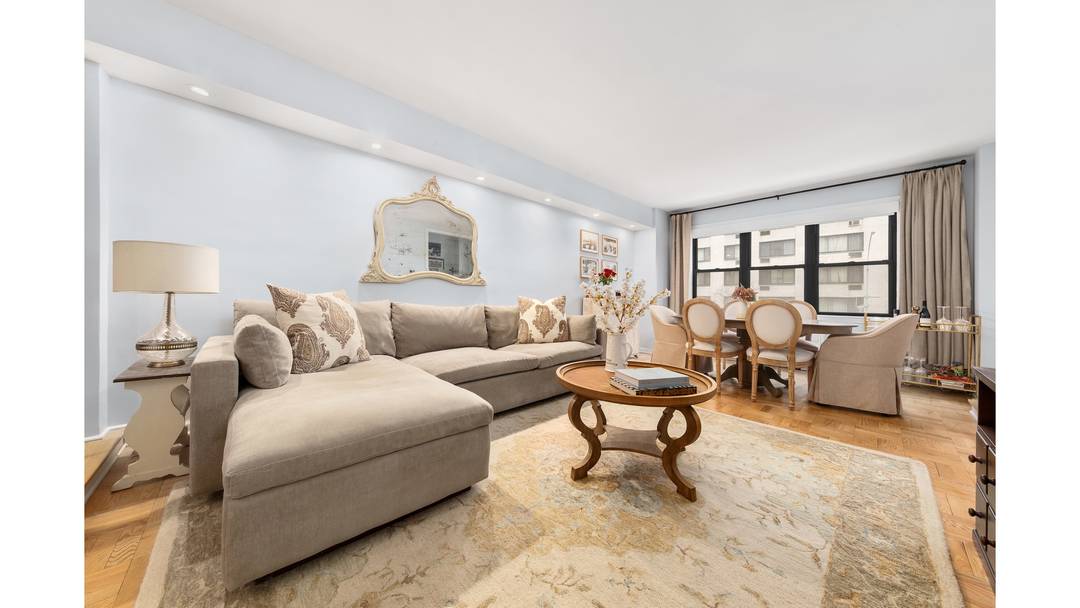 Welcome to 301 East 48th Street, Unit 2G, an oversized convertible two bedroom co op in the heart of Midtown East.