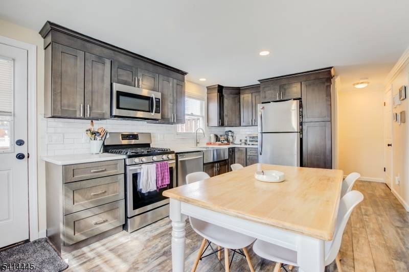 Updated 2 bedroom, 1. 5 bath home featuring three levels of finished living space.