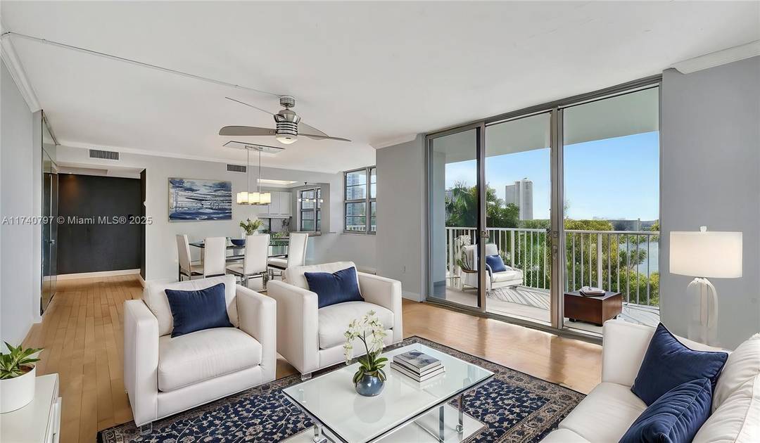 Discover this spacious corner two bedroom, two bath apartment boasting stunning waterfront views and an abundance of natural light.