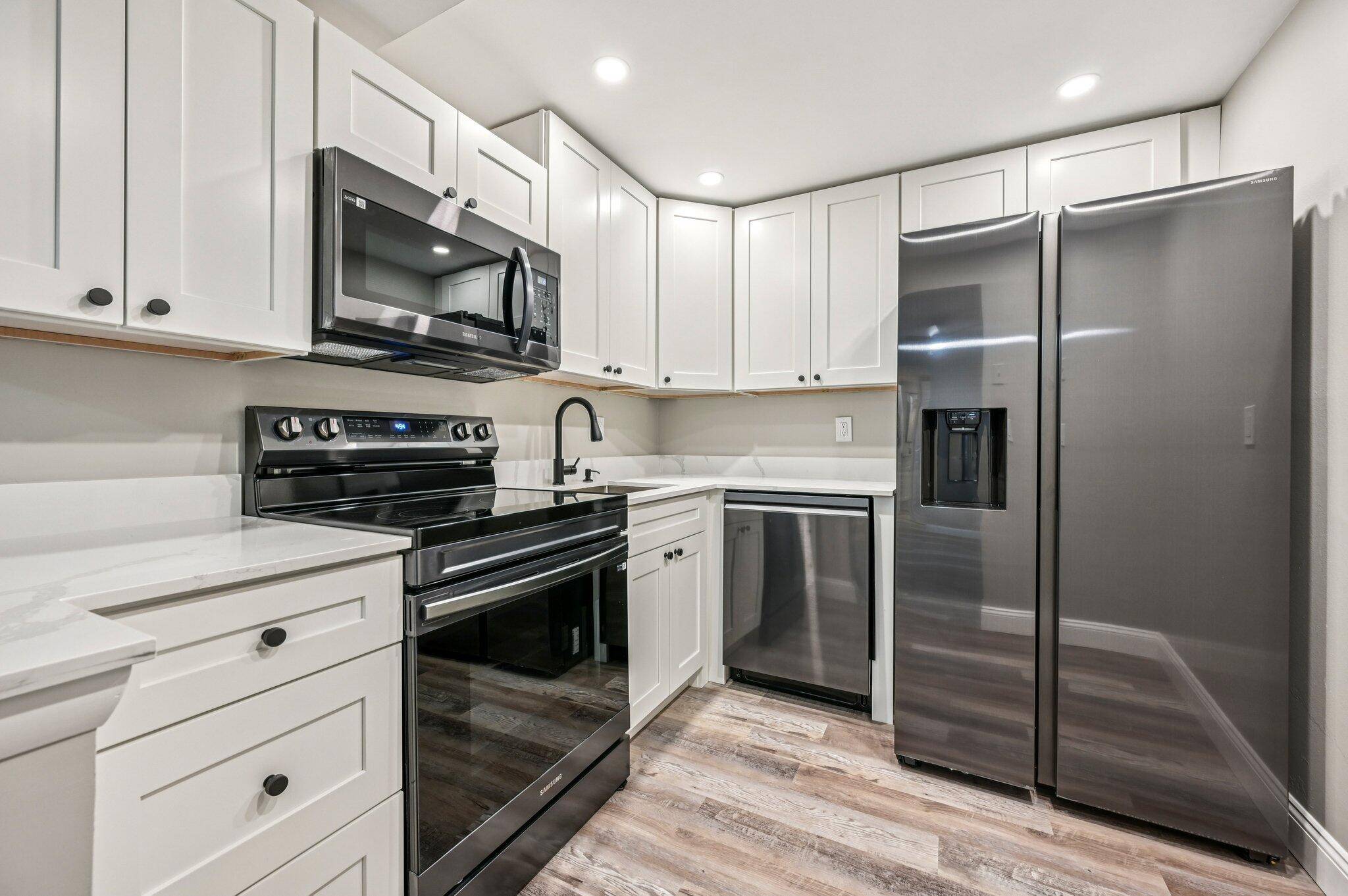 Absolutely immaculate 1st floor unit that has been completely updated featuring an in unit full size washer dryer.