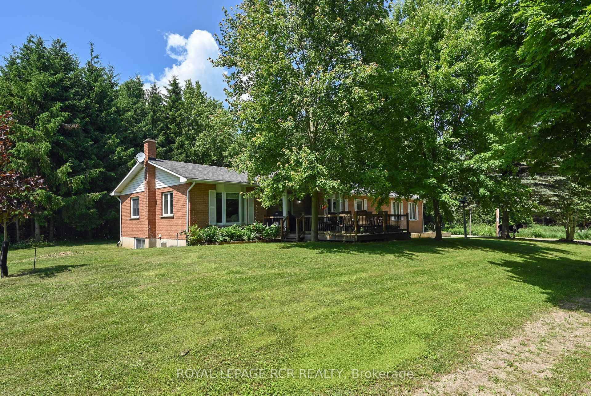 Everything you have been looking for in a rural property, including privacy, easy access to town amenities, well maintained bungalow amp ; large 25 ft.