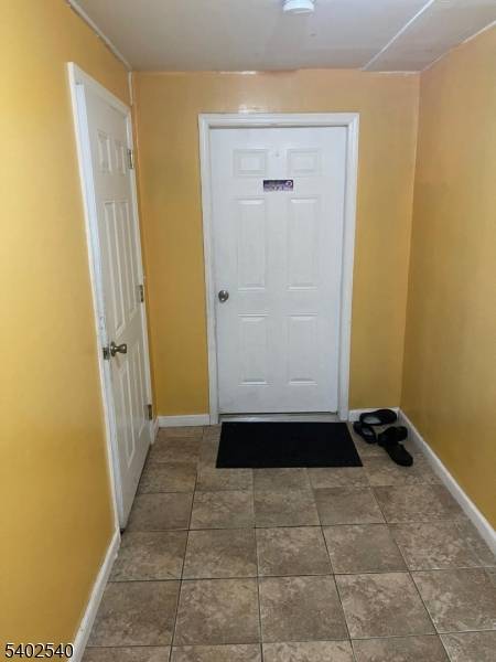 Three stories two family home all fully rented with owner occupying one of the units.