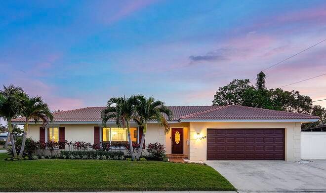 Beautifully maintained 3 bedroom, 2 bath, 2 car garage home in EAST BOCA located just minutes from the BEACH !