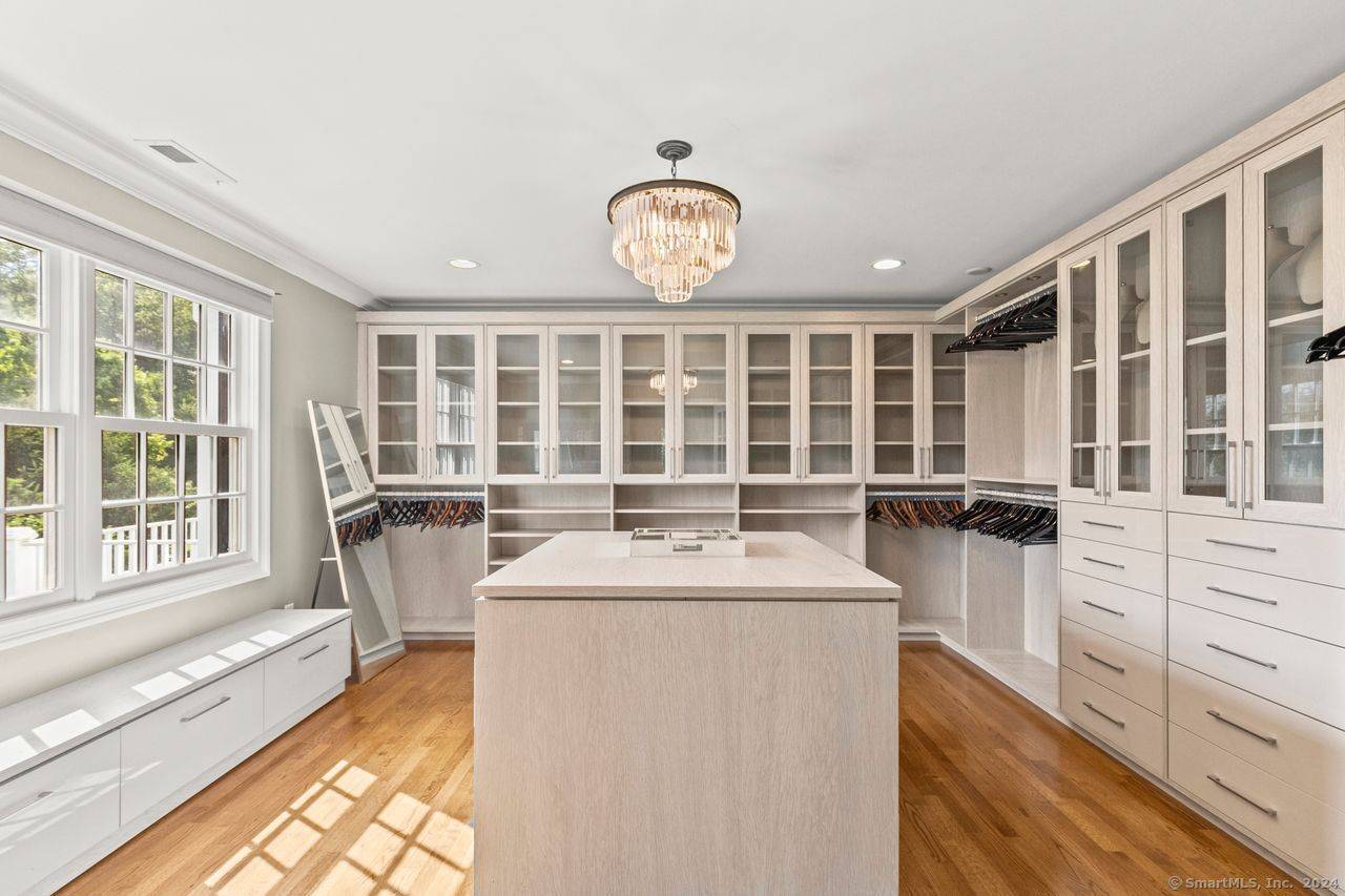 Live The Luxury Life in this magnificent 5, 224 square foot colonial residence nestled in a secluded cul de sac within the sought after Easton neighborhood.