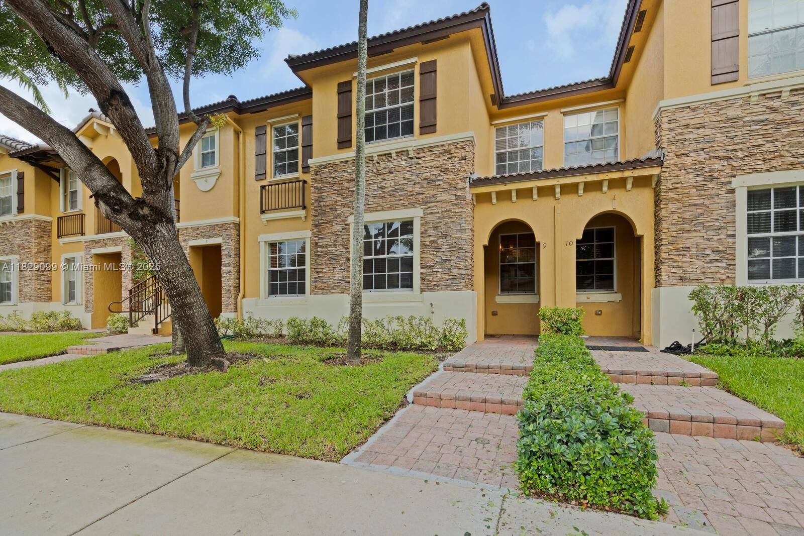 For sale in The Shore, freshly painted, well maintained, spacious, three bedroom, two and half bath townhome.