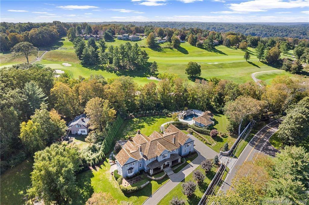 Discover a stunning custom crafted luxury home, complete with a separate one bedroom guest pool house, that stands as an architecturally significant estate designed to be cherished.