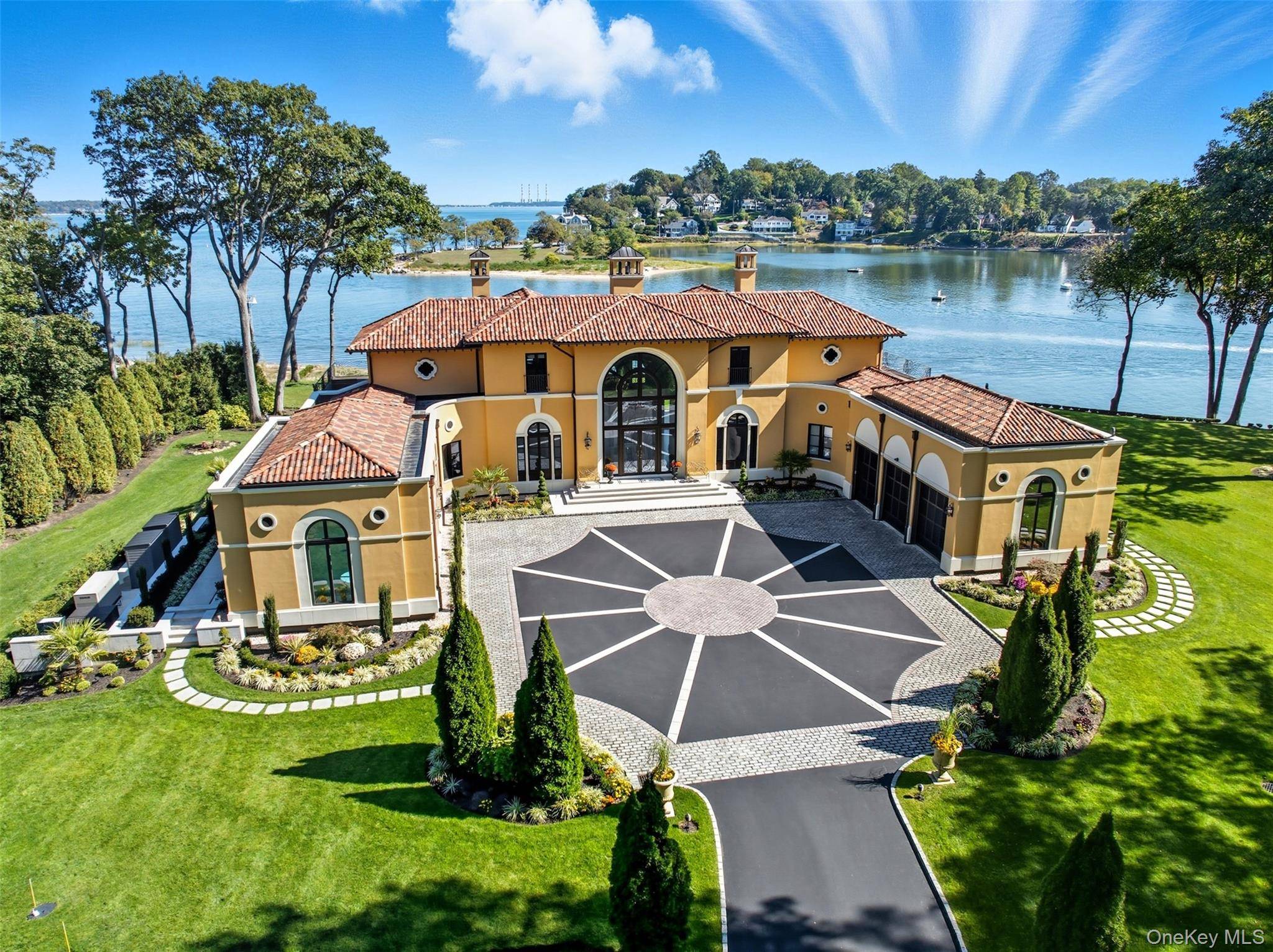 Welcome to Palm Beach North, an extraordinary waterfront villa in the exclusive enclave of Lloyd Harbor.