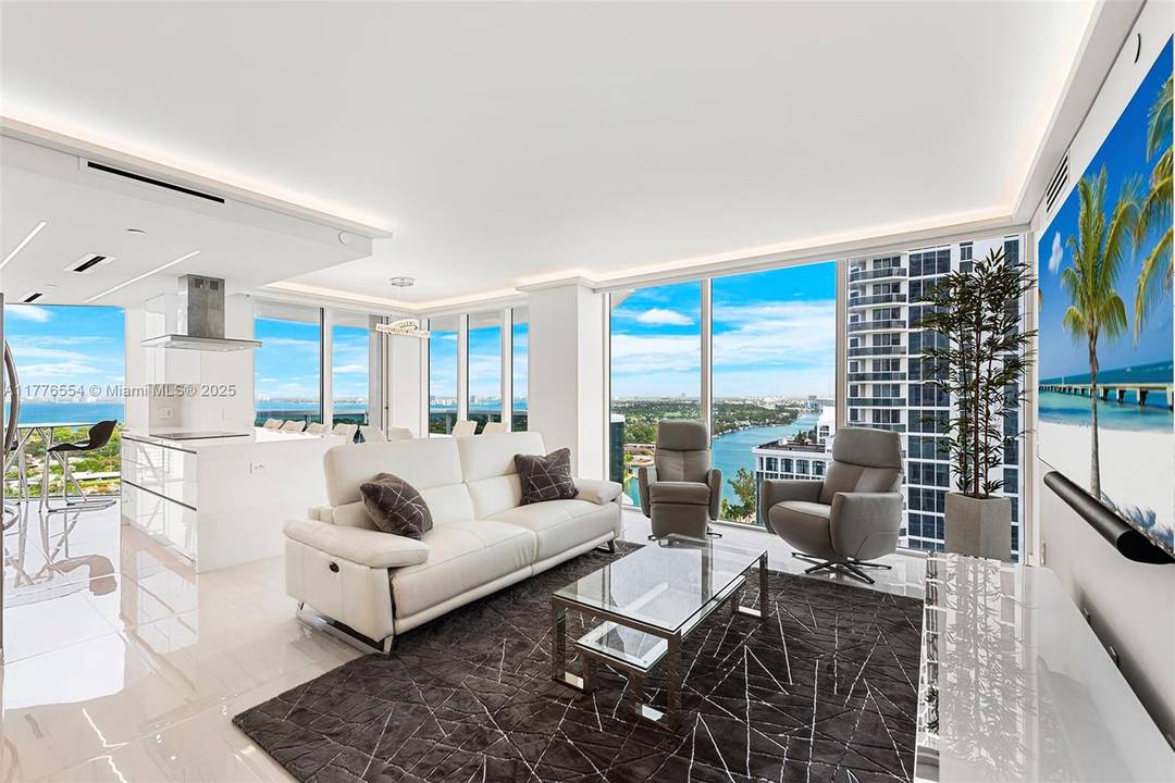 Welcome to your beautifully furnished remodeled residence, offering sweeping views of the ocean, Intracoastal, amp ; city skyline.
