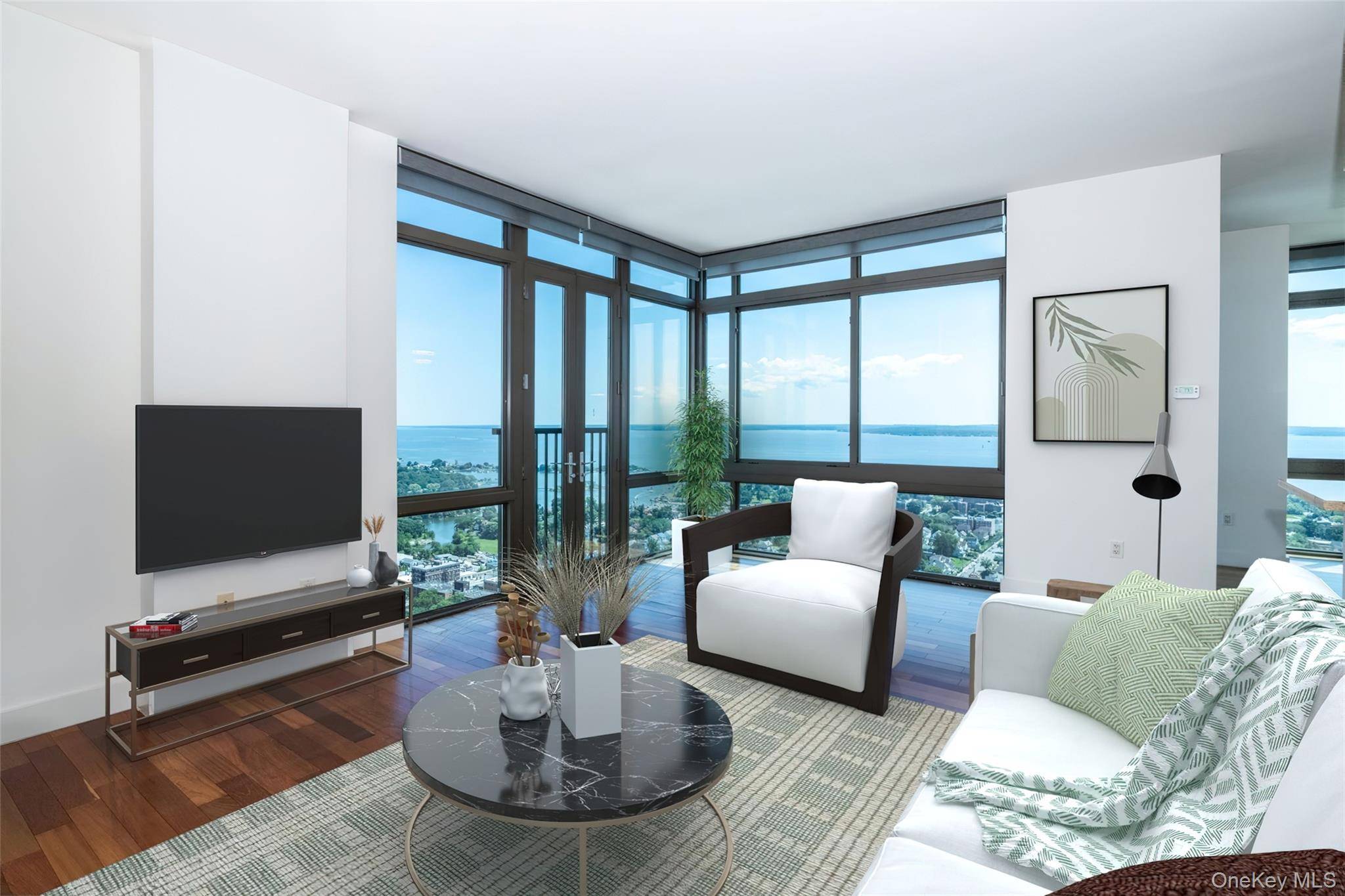 Perched high above the city, this exceptional three bedroom corner residence offers panoramic views of the Long Island Sound and an unparalleled living experience.
