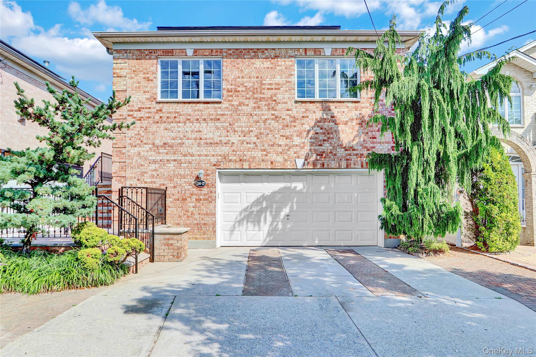 Beautiful hi Ranch style home boasting brick construction, beautiful pavers, exceptional hardwood flooring, entertainer s kitchen with center island and stainless steel appliances, updated bathrooms and views of the bridge ...
