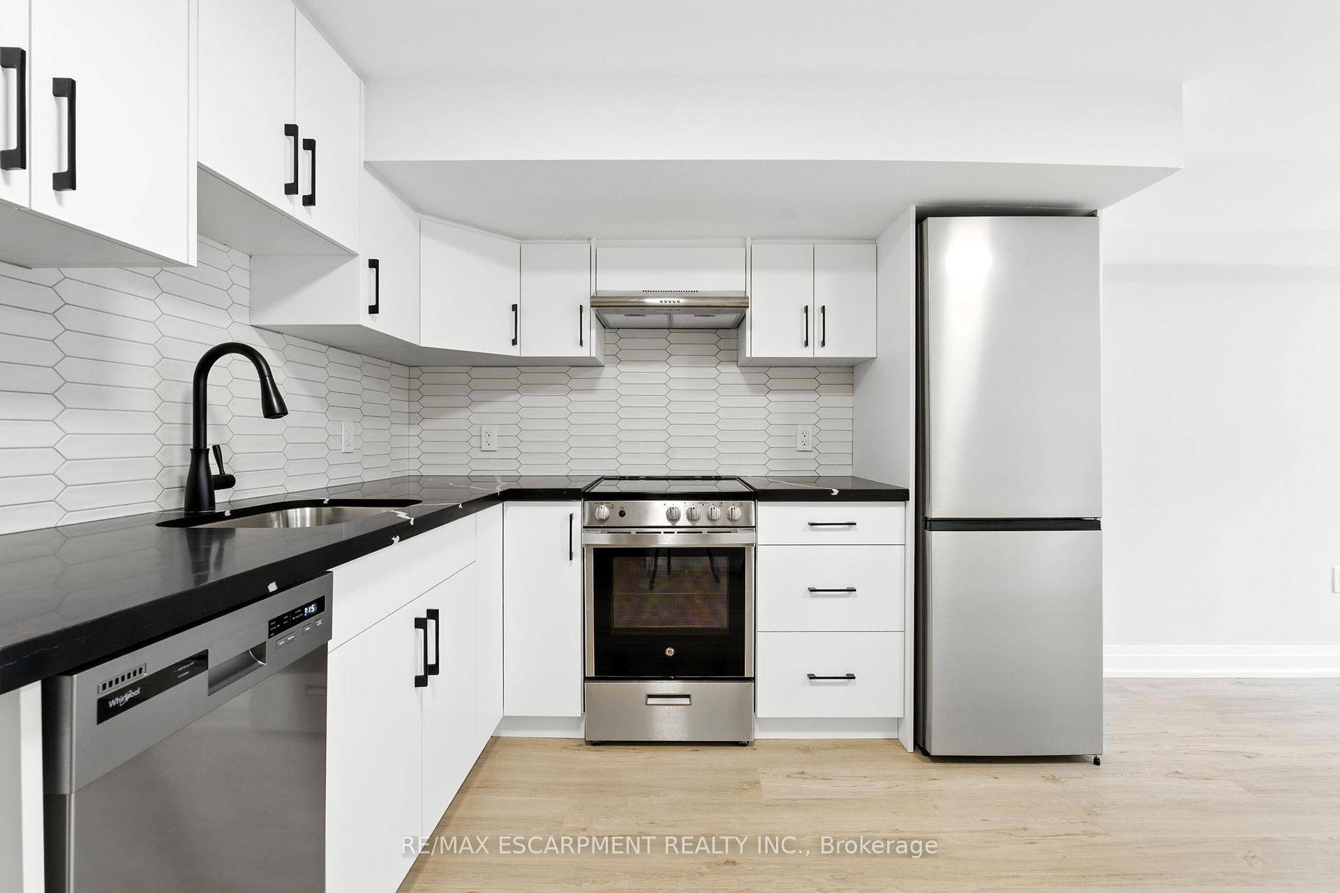 Step into this fully renovated split level unit that combines modern updates with a unique layout full of charm and character.