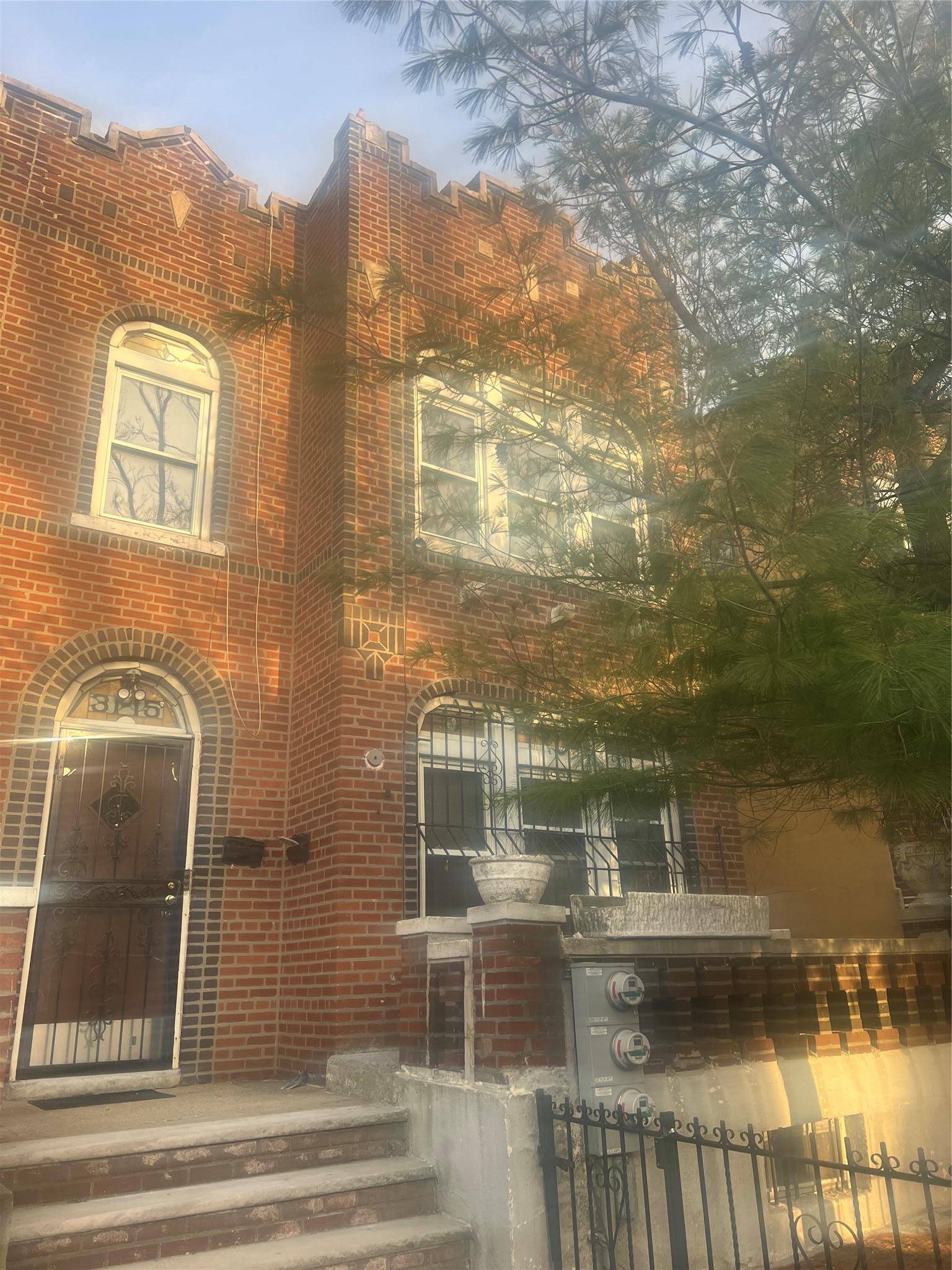 Large Two Family Brick With 2 Car Garage !