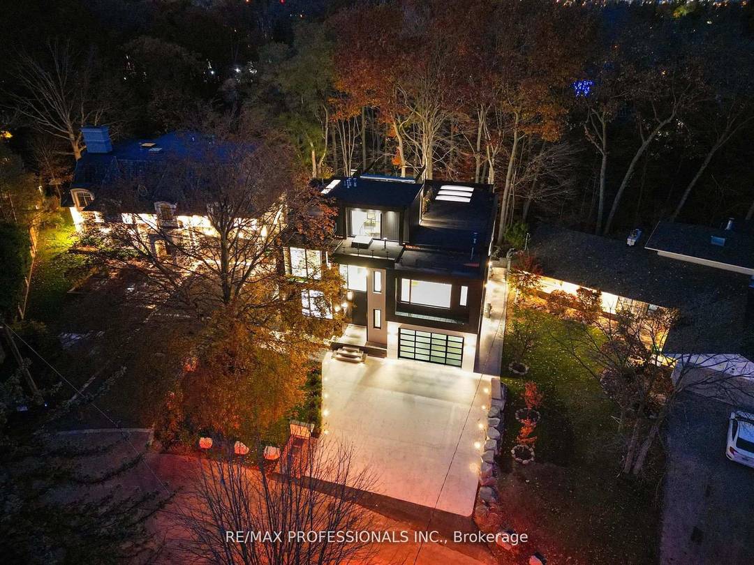 Experience posh luxury living at 91 Valecrest Drive, a distinguished residence set against a breathtaking ravine backdrop.