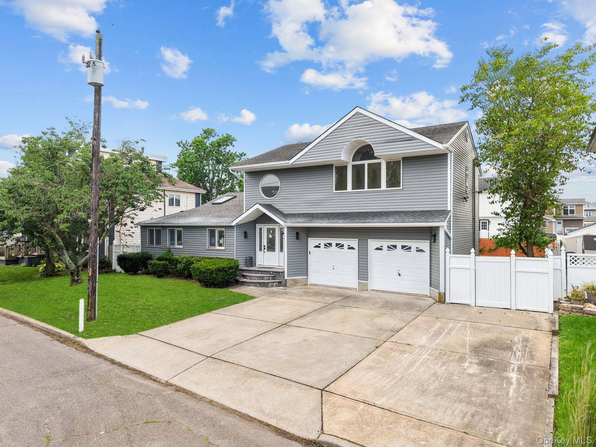 Fully renovated 3 bedroom, 2 bathroom home with modern finishes and a huge backyard in a quiet Seaford neighborhood.