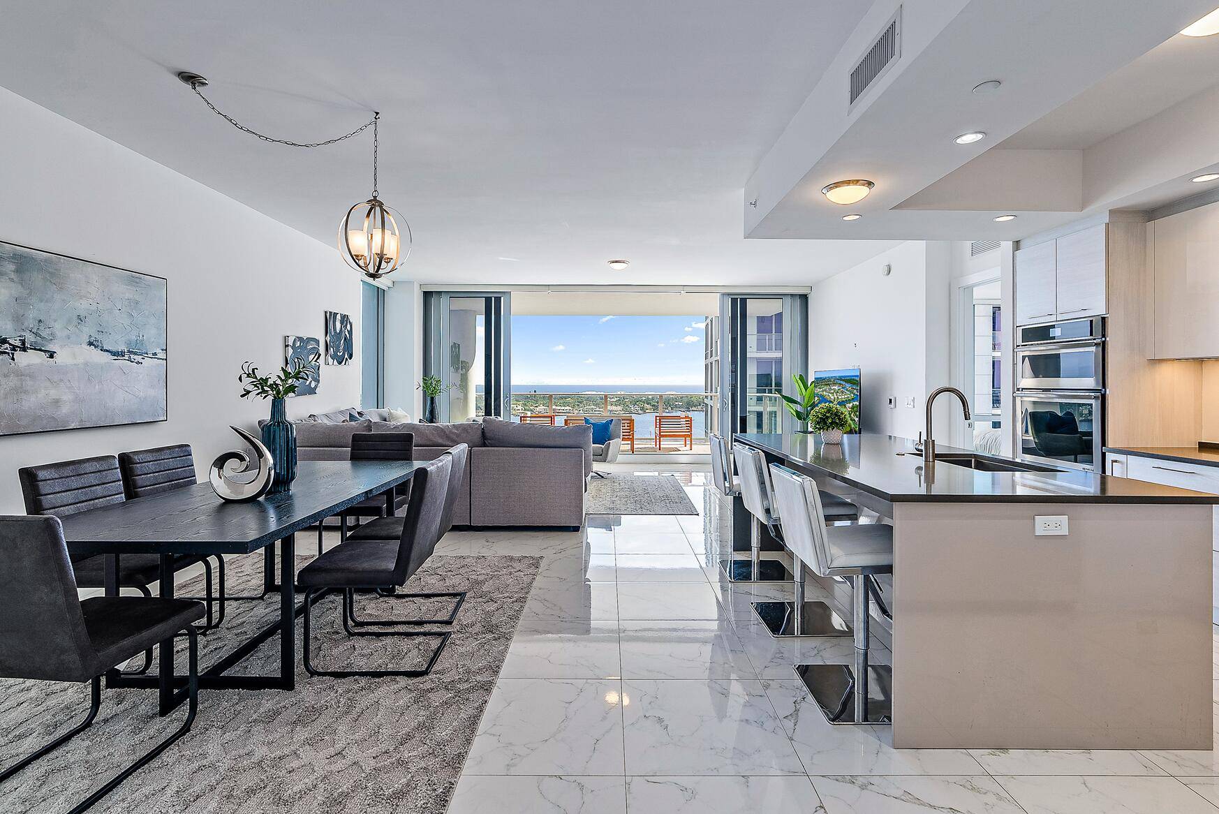Enjoy dramatic direct water views from this excellent 3 bedroom den with its own full bath.