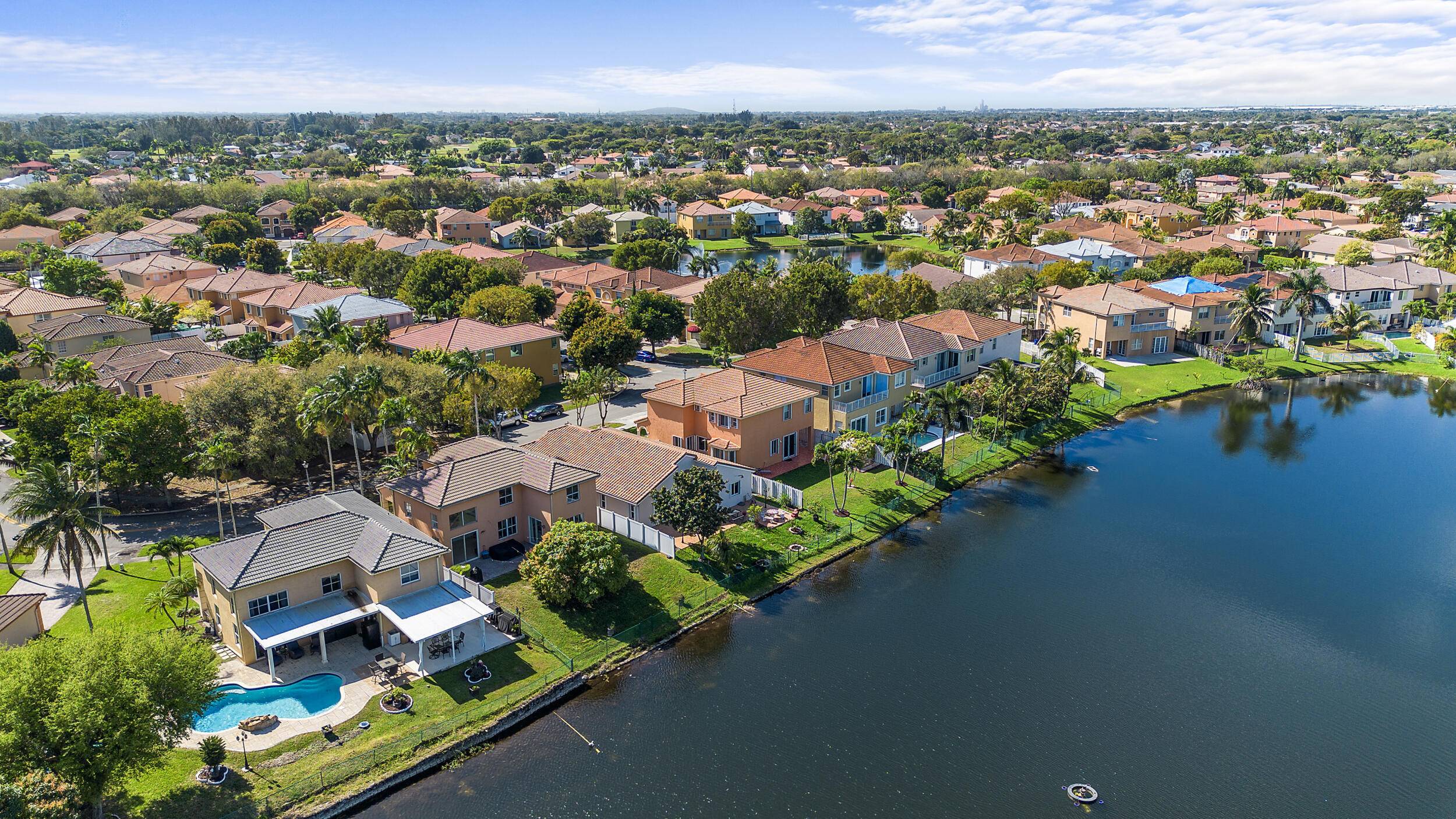 Welcome to this meticulously upgraded 4 bedroom, 3 bathroom, two story waterfront retreat in the highly sought after Viscaya Community in Miramar.