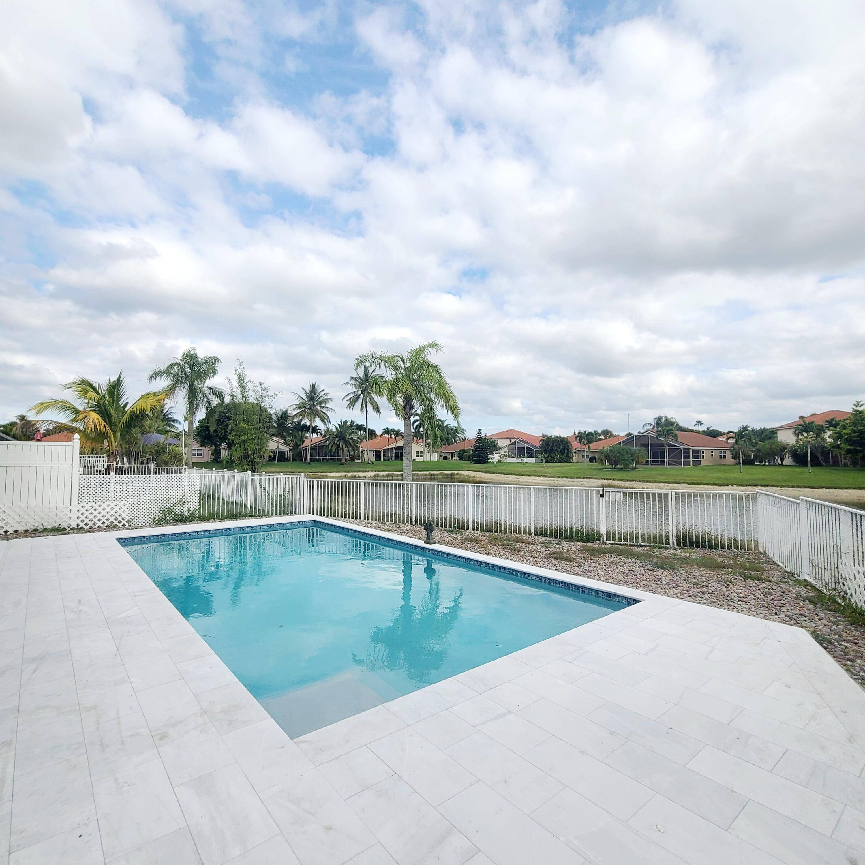 Magnificent Oversized Lakefront Estate boasting an impressive array of luxurious upgrades, including a brand new roof installed in '25.
