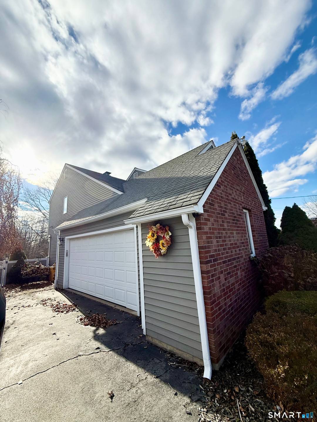 Spacious Contemporary Colonial set on a quiet cul de sac with beautiful sunset views from the deck.