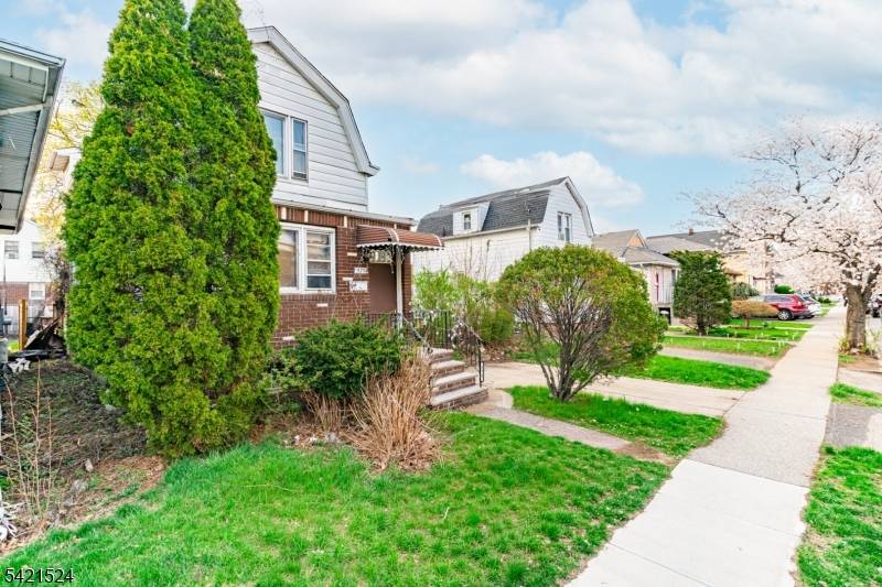 Two family home located at 375 Westervelt Place in Lodi, NJ, offering approximately 1, 242 square feet of living space on a 37 x 100 lot.