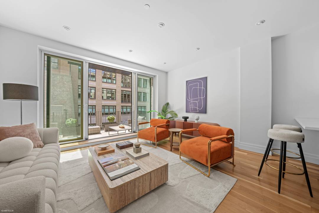 Step into this beautiful full floor Parlor Residencean airy 1, 130 square foot condo apartment with two bathrooms and a private terrace for outdoor lounging or entertaining.